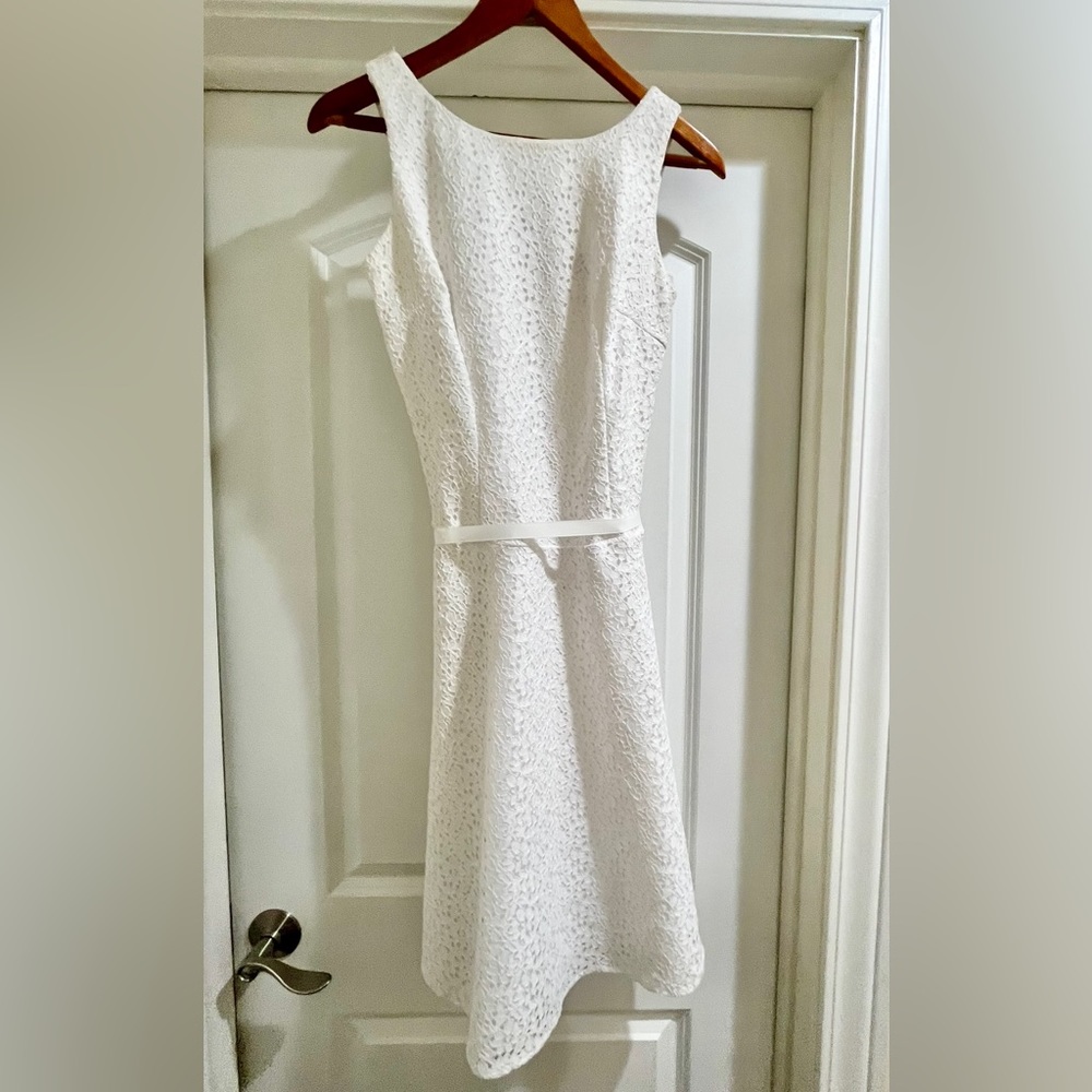 Beautiful white dress with belt. Like new. Fits Sz 4-6
